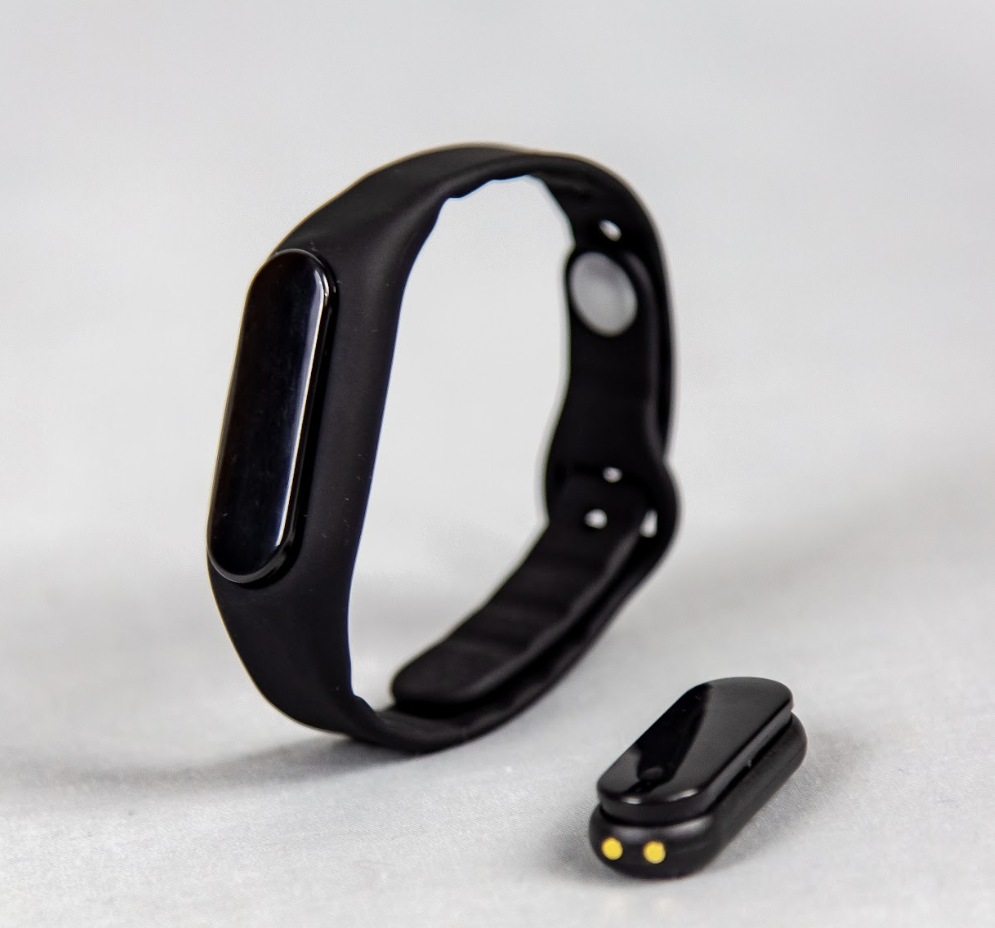 The AxLE wristband in black silicone.